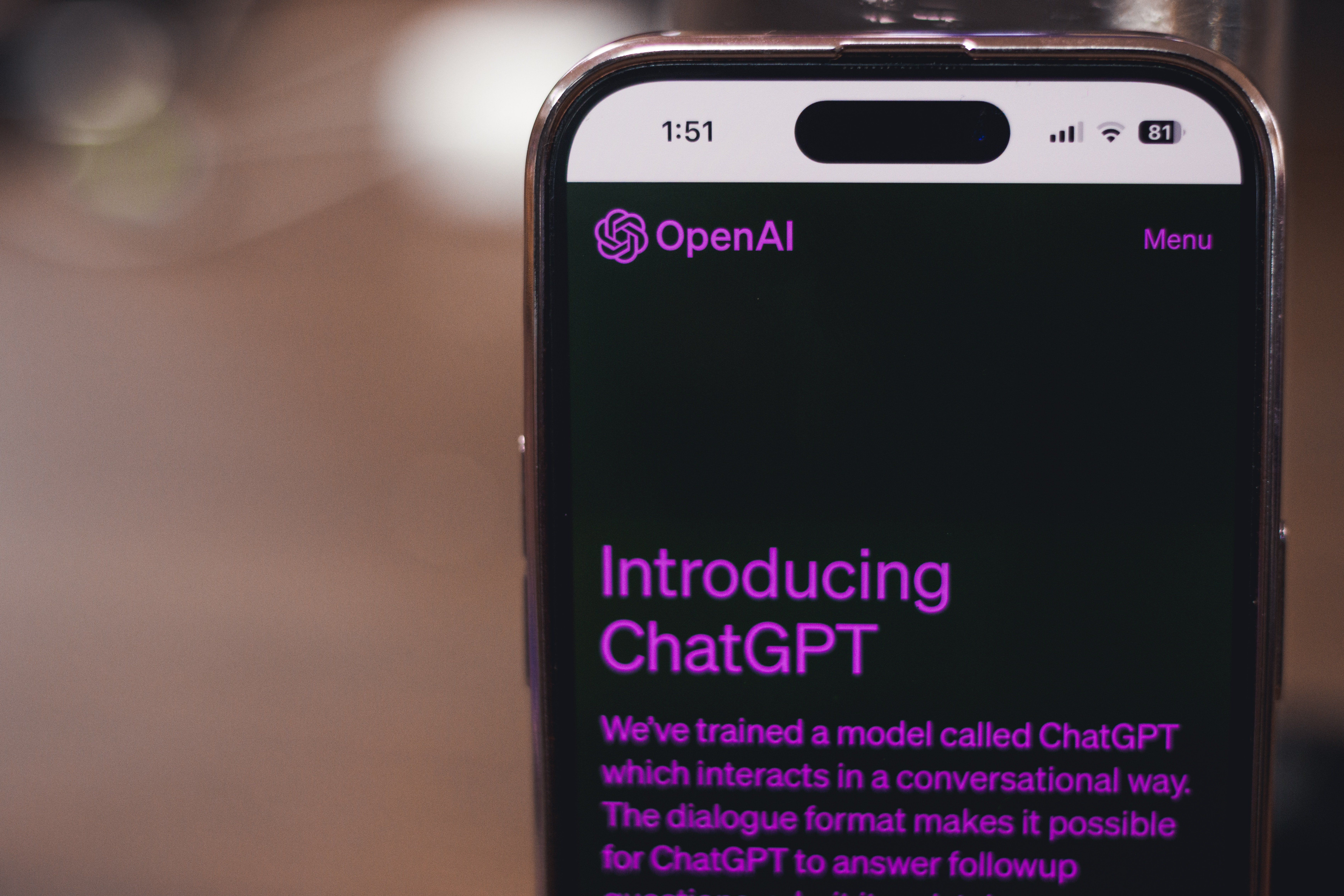 a close up of a cell phone featuring ChatGPT