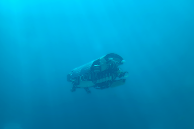 technical machinery floating in the ocean underwater